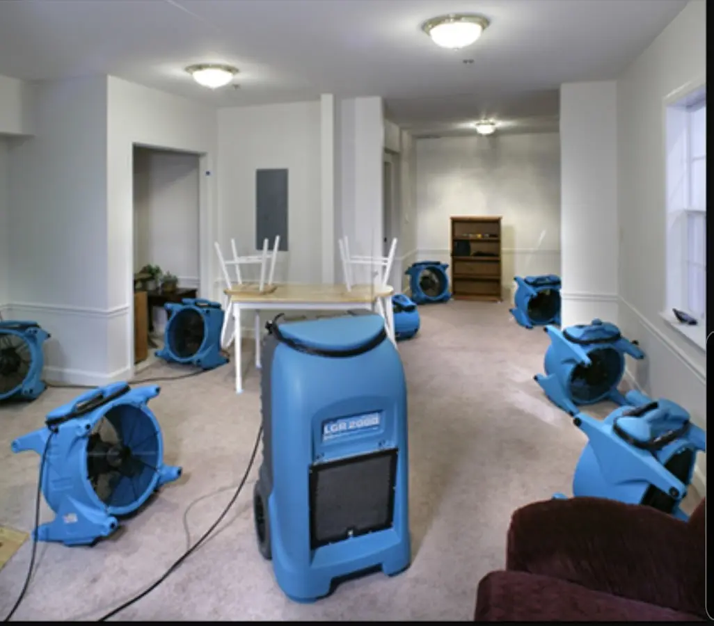 Air movers and dehumidifier setup for Water Damage Restoration in Terrytown
